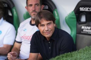 Conte sorride